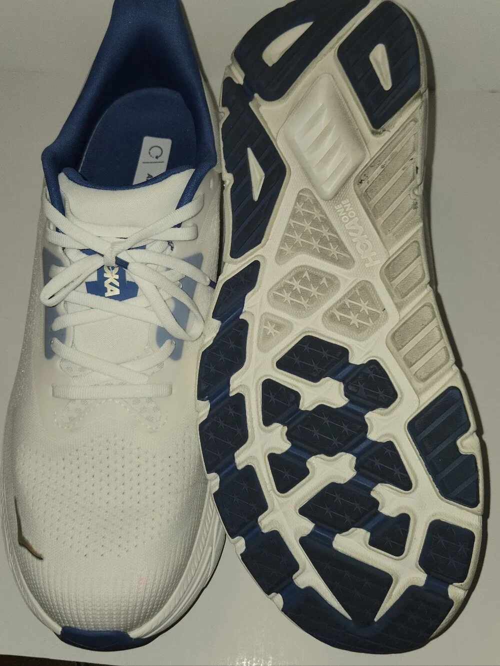 Hoka One One White and Navy Athletic Running Shoes with Gold Logo